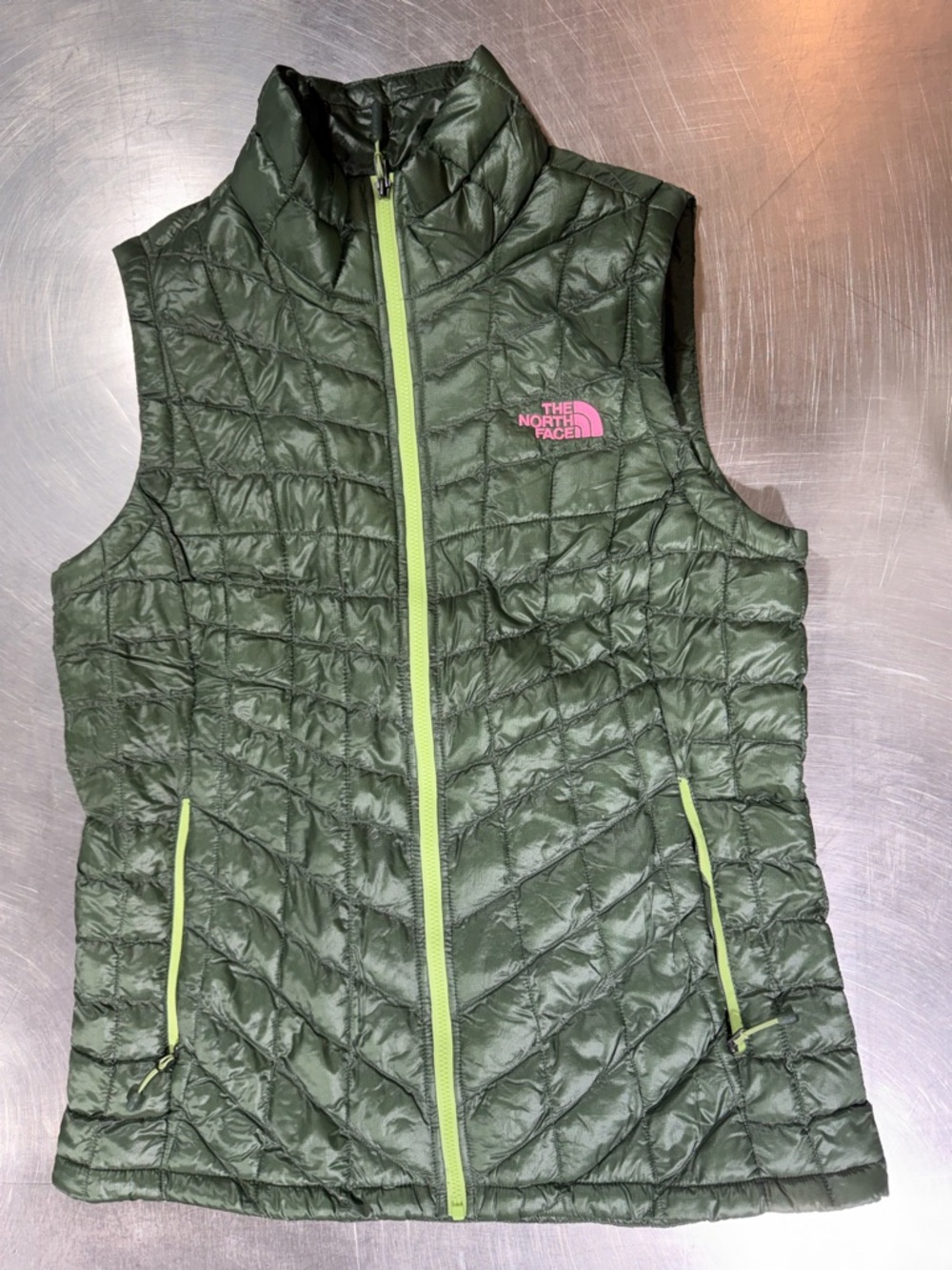 The North Face Olive Quilted Vest with Pink Logo and Lime Zipper